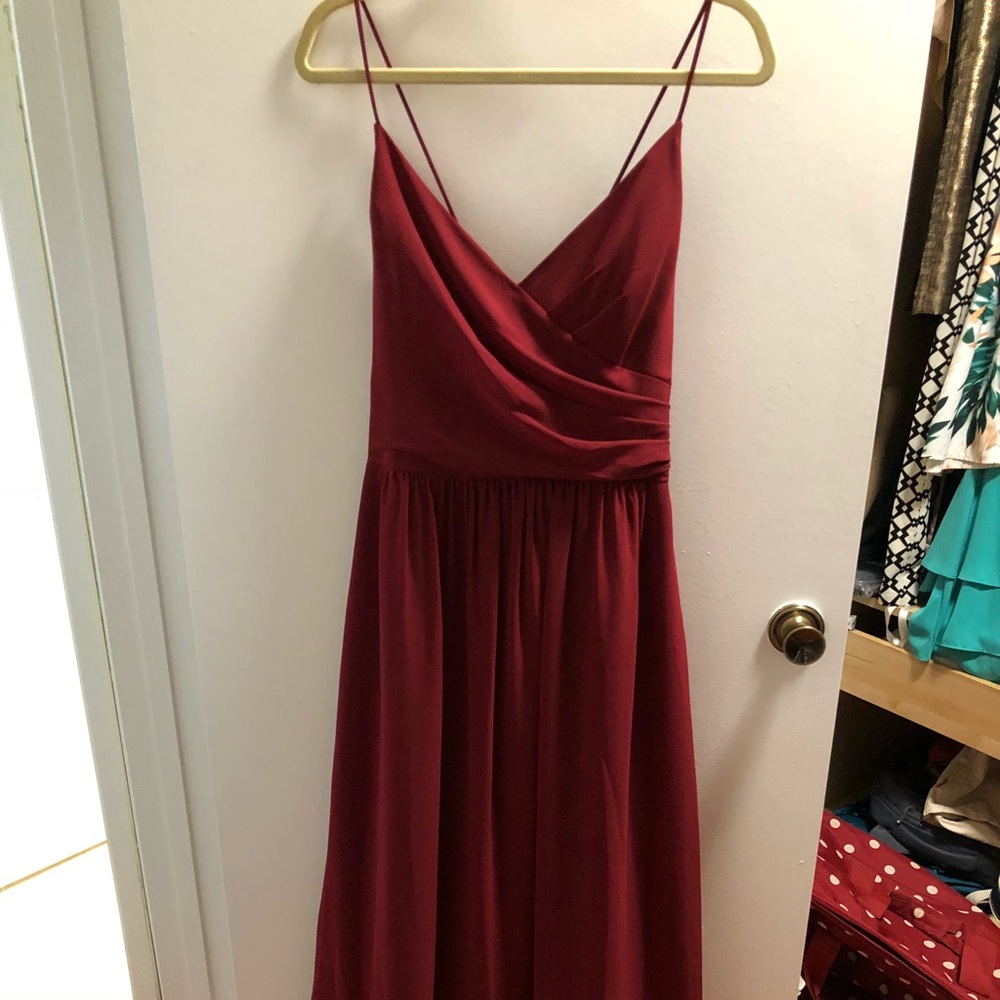 Floor length burgundy dress with crisscross straps